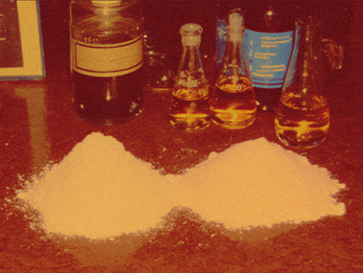 Zinc oxide and titanium dioxide powder vials representing the two FDA GRASE confirmed sunscreen actives